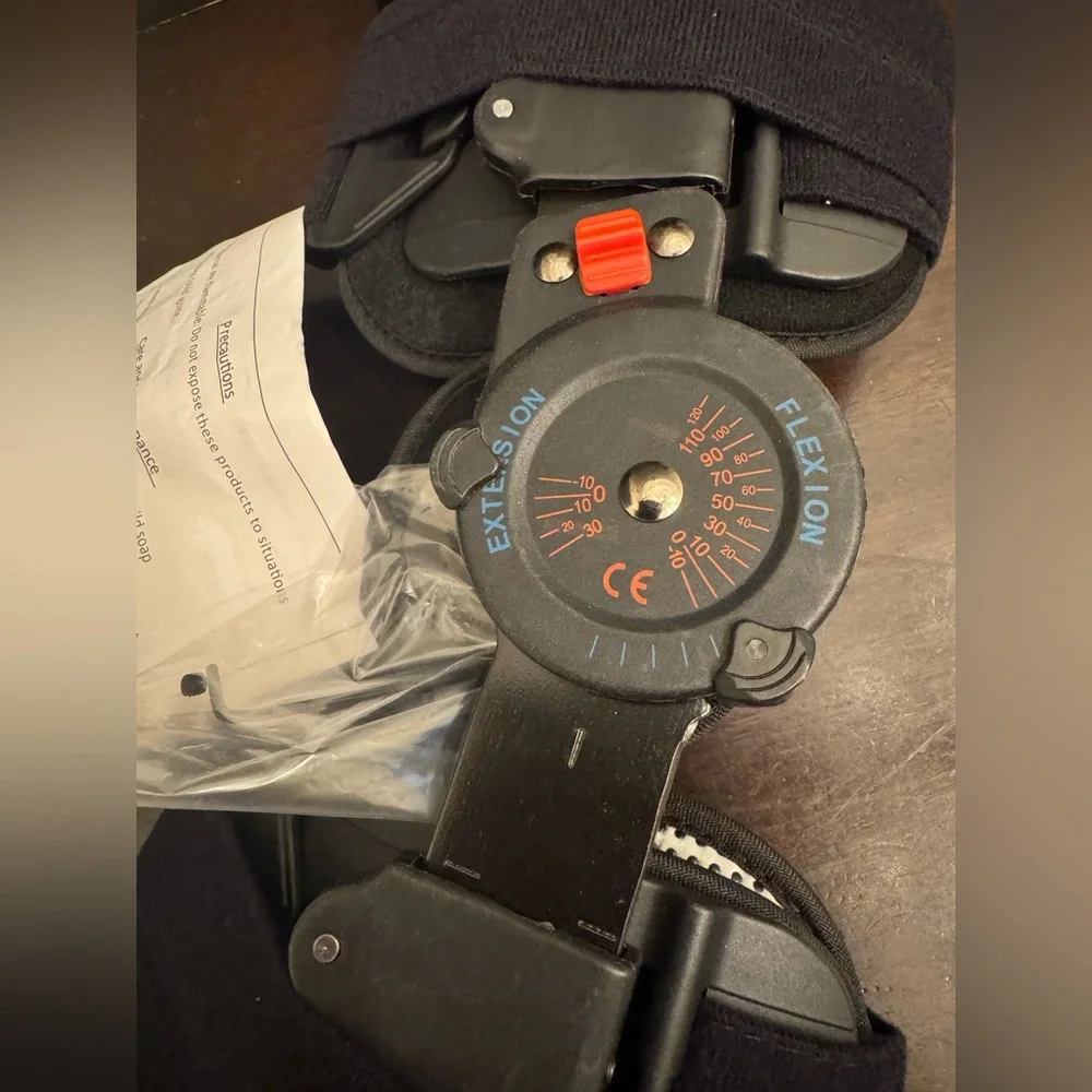 Adjustable Black Hinged Knee Brace with ROM Dial Support